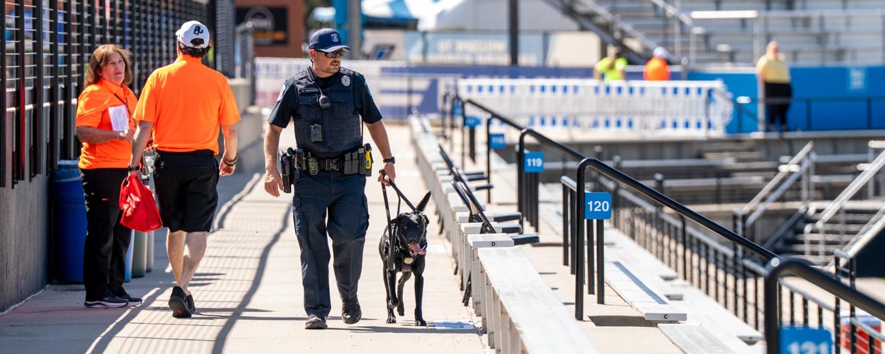 K9 Scout and Officer Weaver sweep stadium